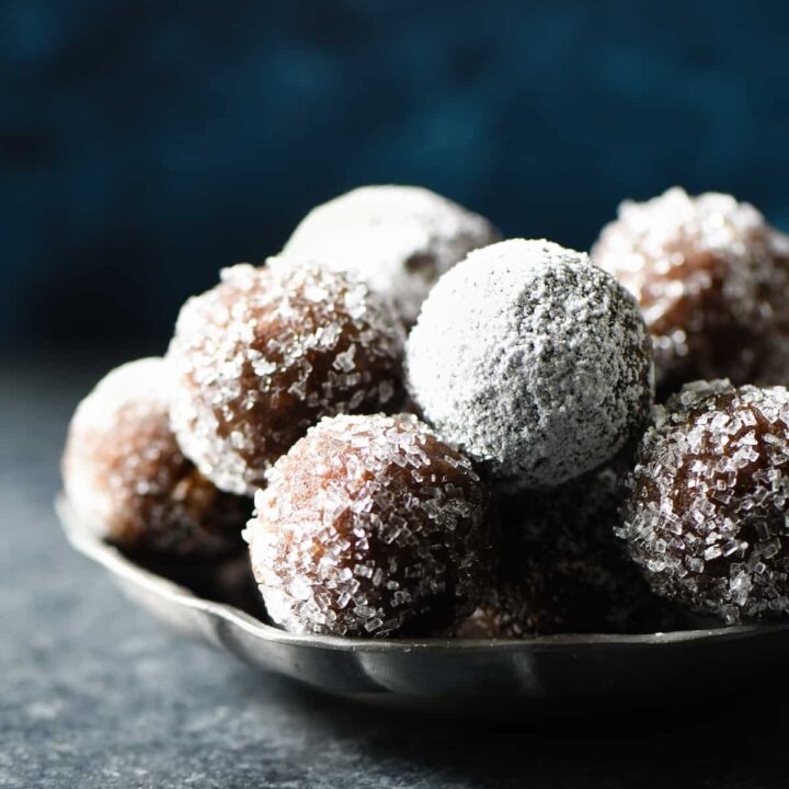 These Almond Flour Rum Balls are a sophisticated alternative to frosting-laden holiday treats, and perfect with a cup of coffee or tea. Naturally gluten free. | foxeslovelemons.com