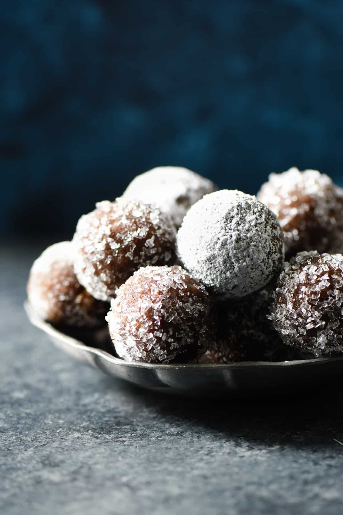 These Almond Flour Rum Balls are a sophisticated alternative to frosting-laden holiday treats, and perfect with a cup of coffee or tea. Naturally gluten free. | foxeslovelemons.com