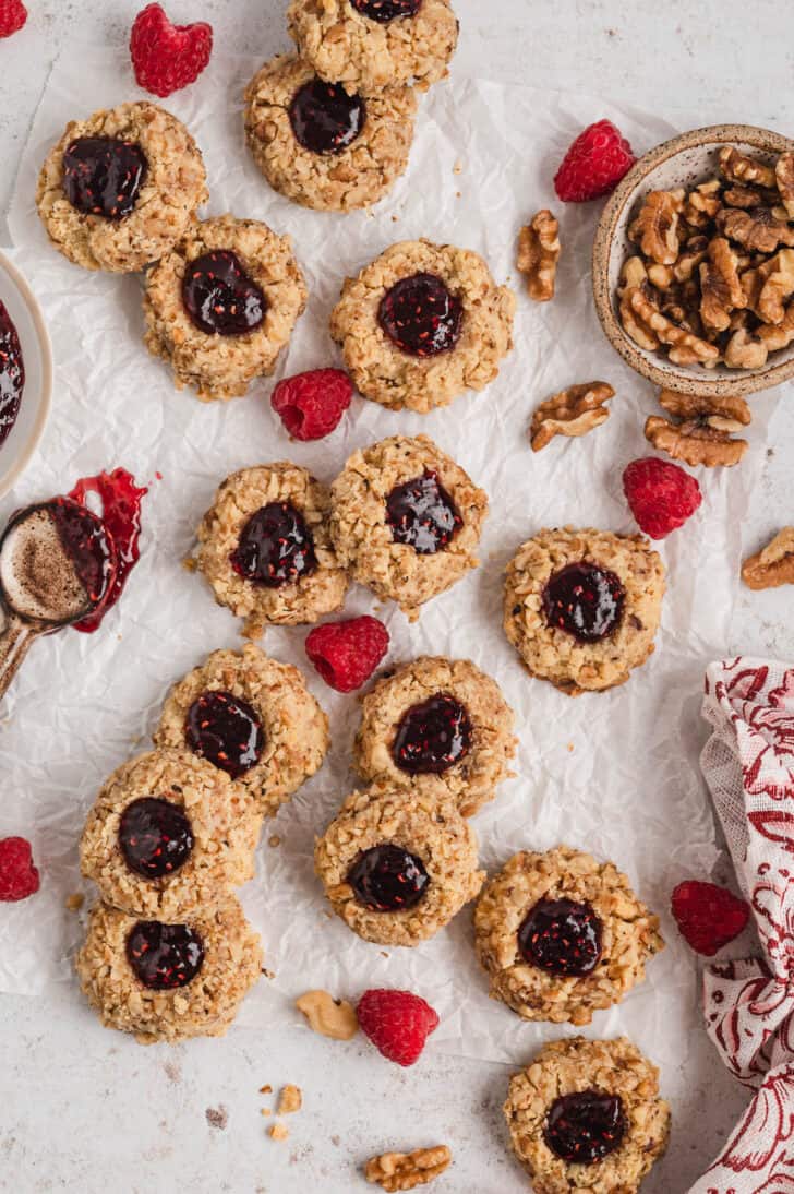 A thumbprint cookie recipe on white parchment paper.